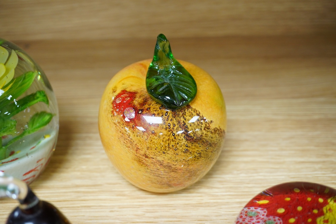 A Collection of five various glass paperweights, largest 11cm